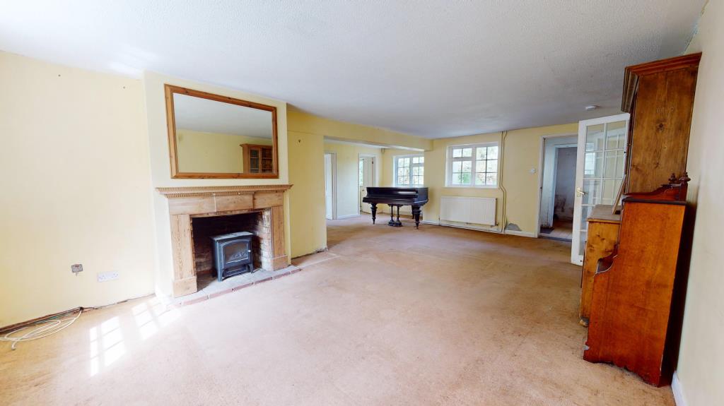 Lot: 2 - SIX-BEDROOM DETACHED HOUSE WITH APPROXIMATELY THREE ACRES OF LAND - Living room with access to kitchen